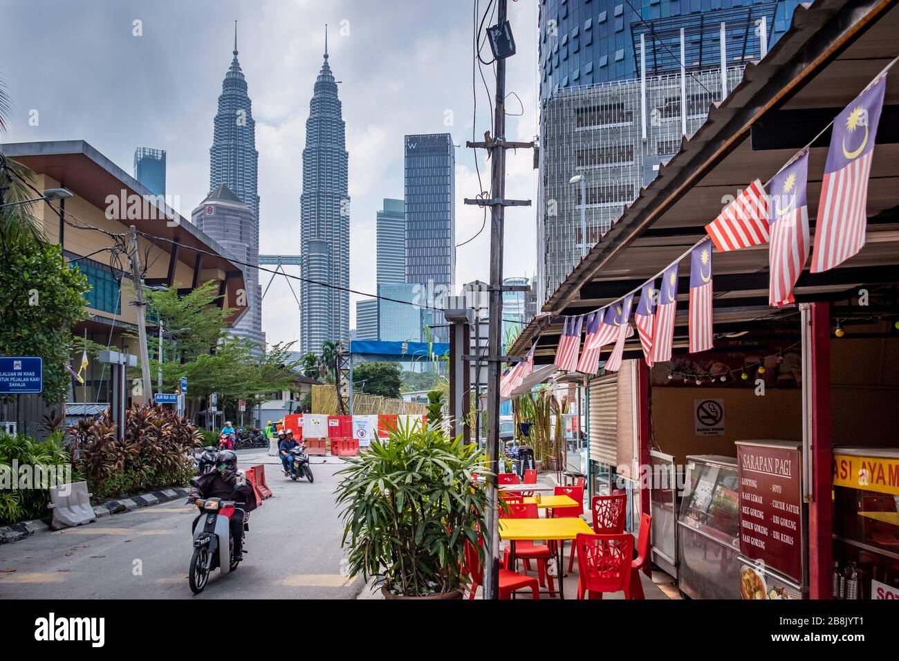 Kuala Lumpur, Malaysia: Petronas Towers from Kampung Baru, illustrating