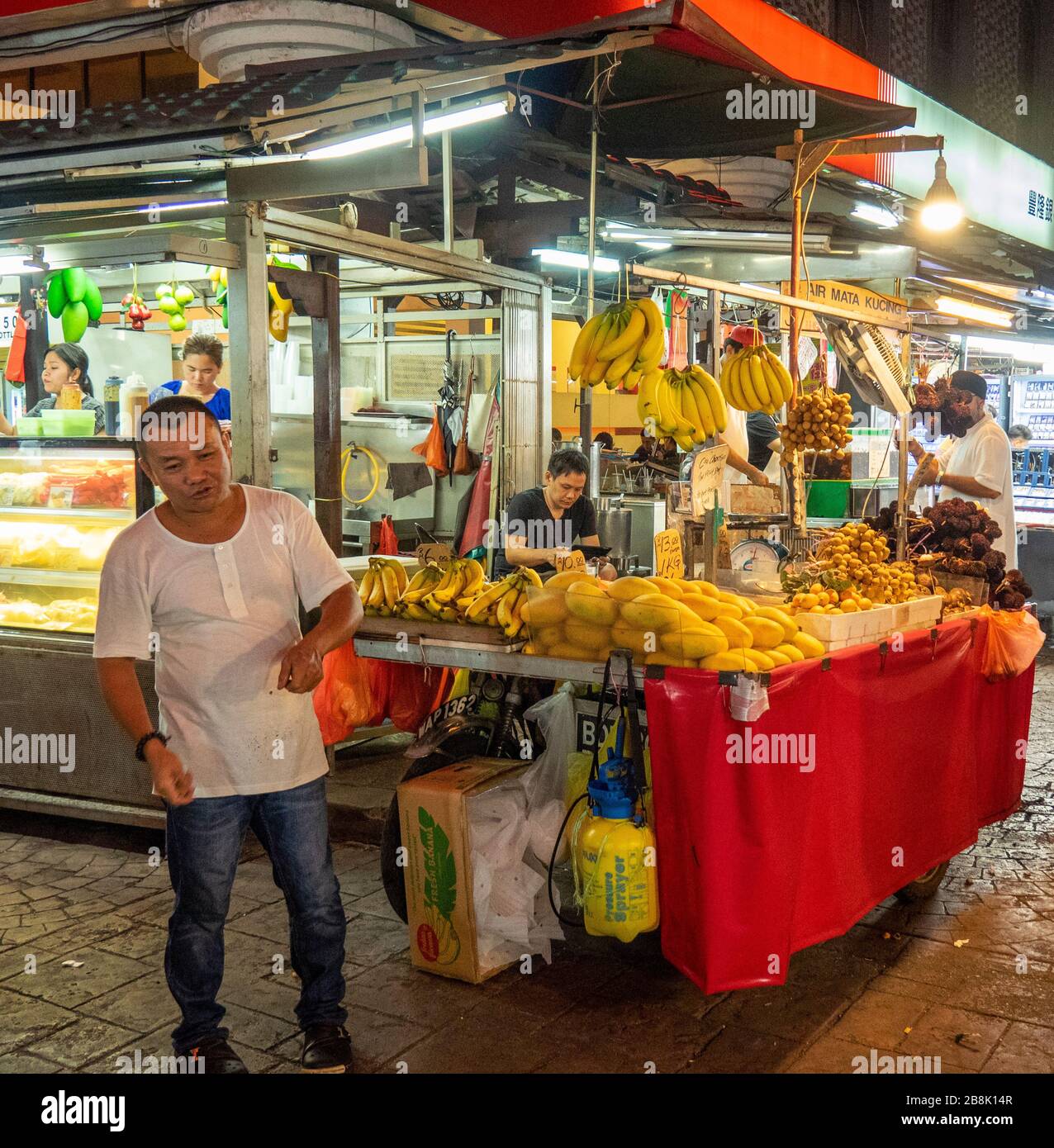 Fruit juice bar at Petaling Street Market at night Kuala Lumpur