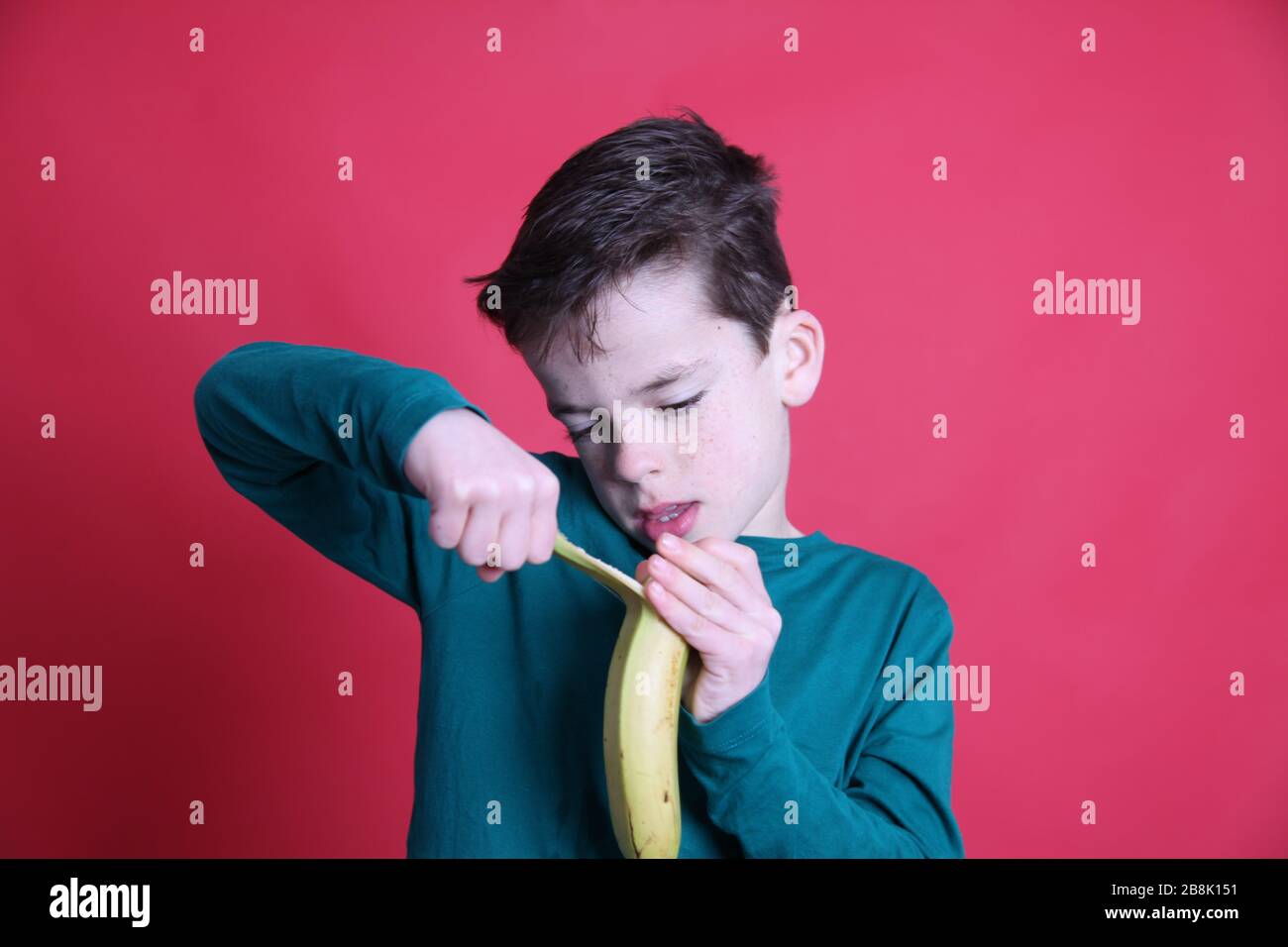 Peeling skin off a banana hi-res stock photography and images - Alamy