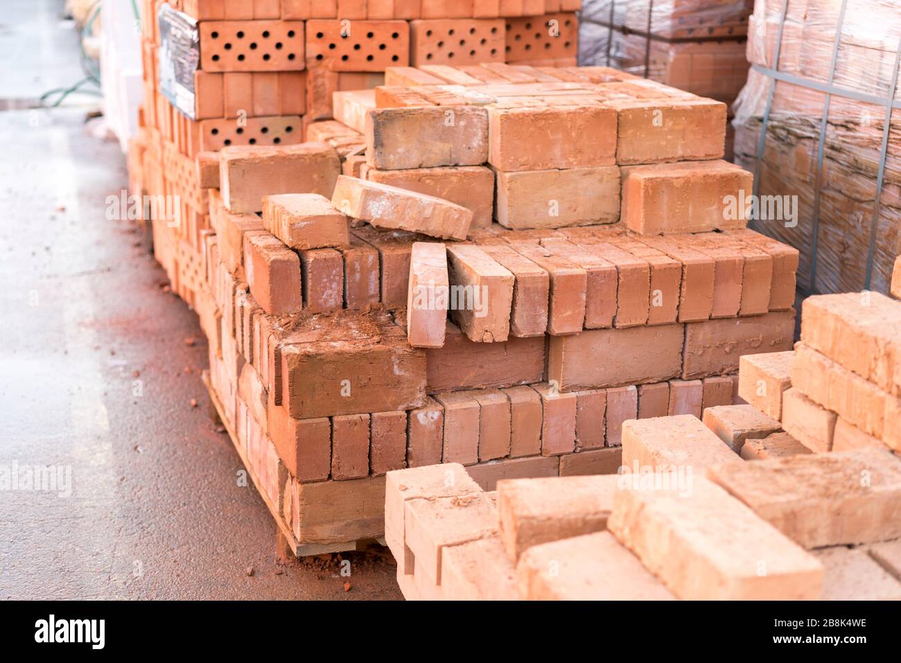 clay brick stored for building construction. Industrial production of