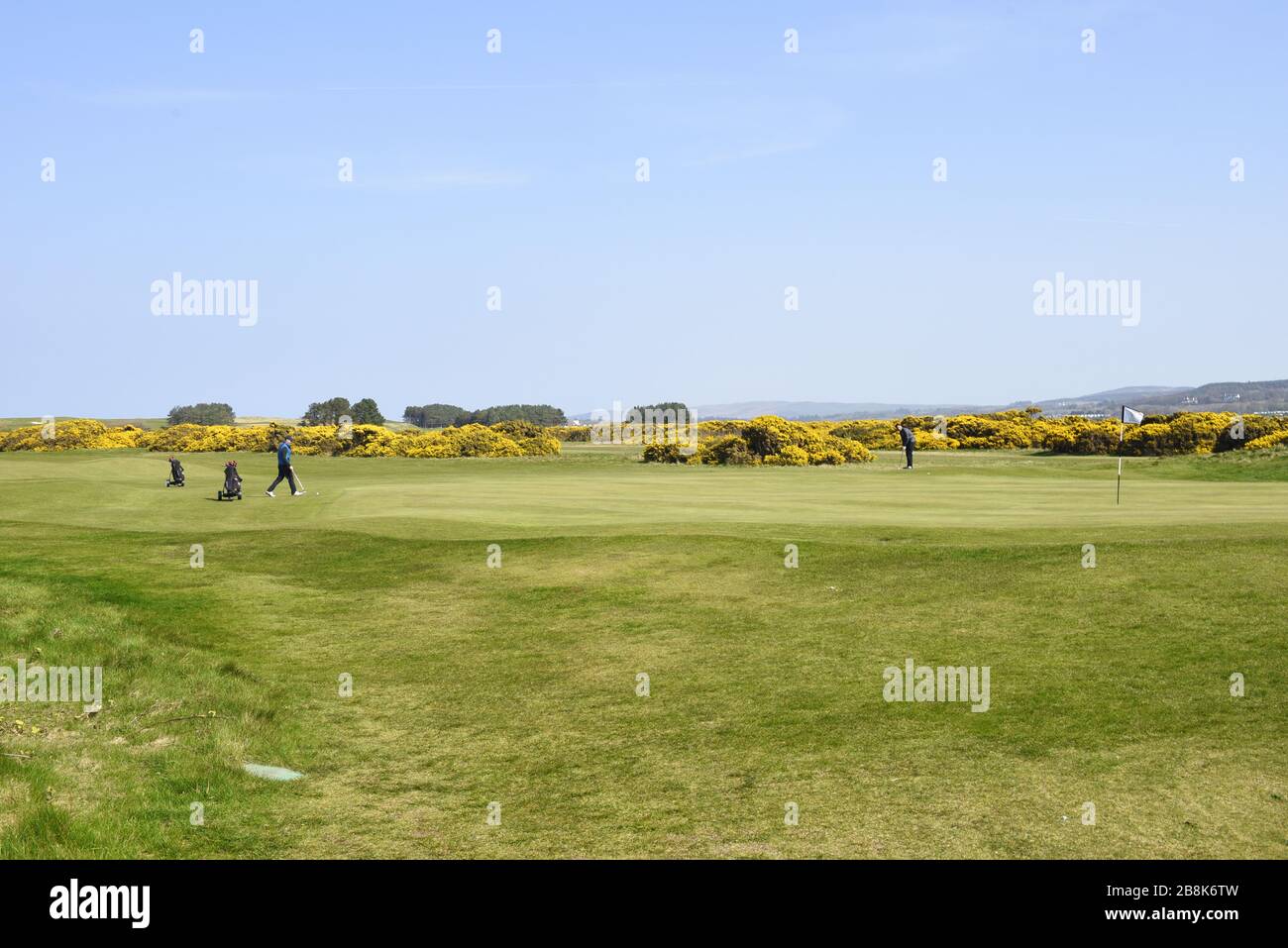 Golf players at Turnberry Golf Course, famously owner by Donald Trump. Near Maybole, South Ayrshire, Scotland Stock Photo