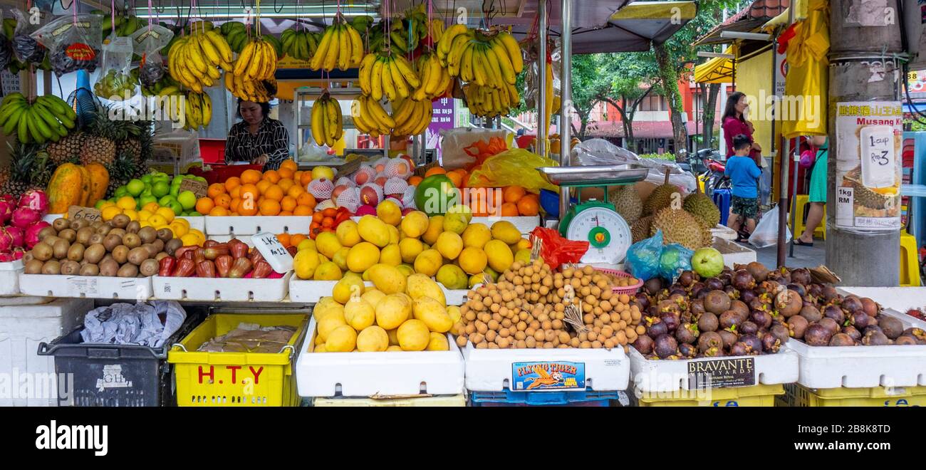Fresh fruit market stall on Jalan Alor Street Bukit Bintang, Kuala Lumpur Malaysia. Stock Photo