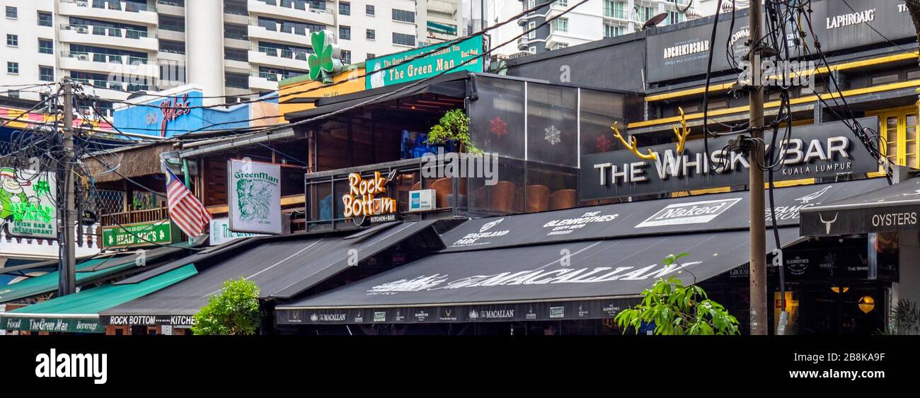 Row of bars and restaurants on Changkat Bukit Bintang street Kuala Lumpur Malaysia. Stock Photo