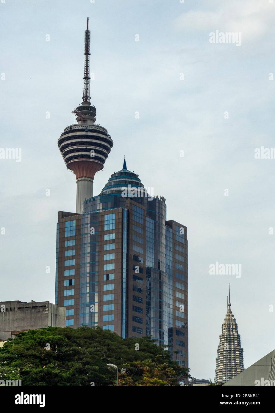Communications tower KL Tower and Menara Olympia Kuala Lumpur Malaysia. Stock Photo