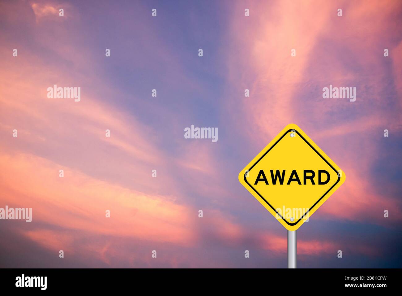Yellow transportation sign with word award on violet sky background Stock Photo