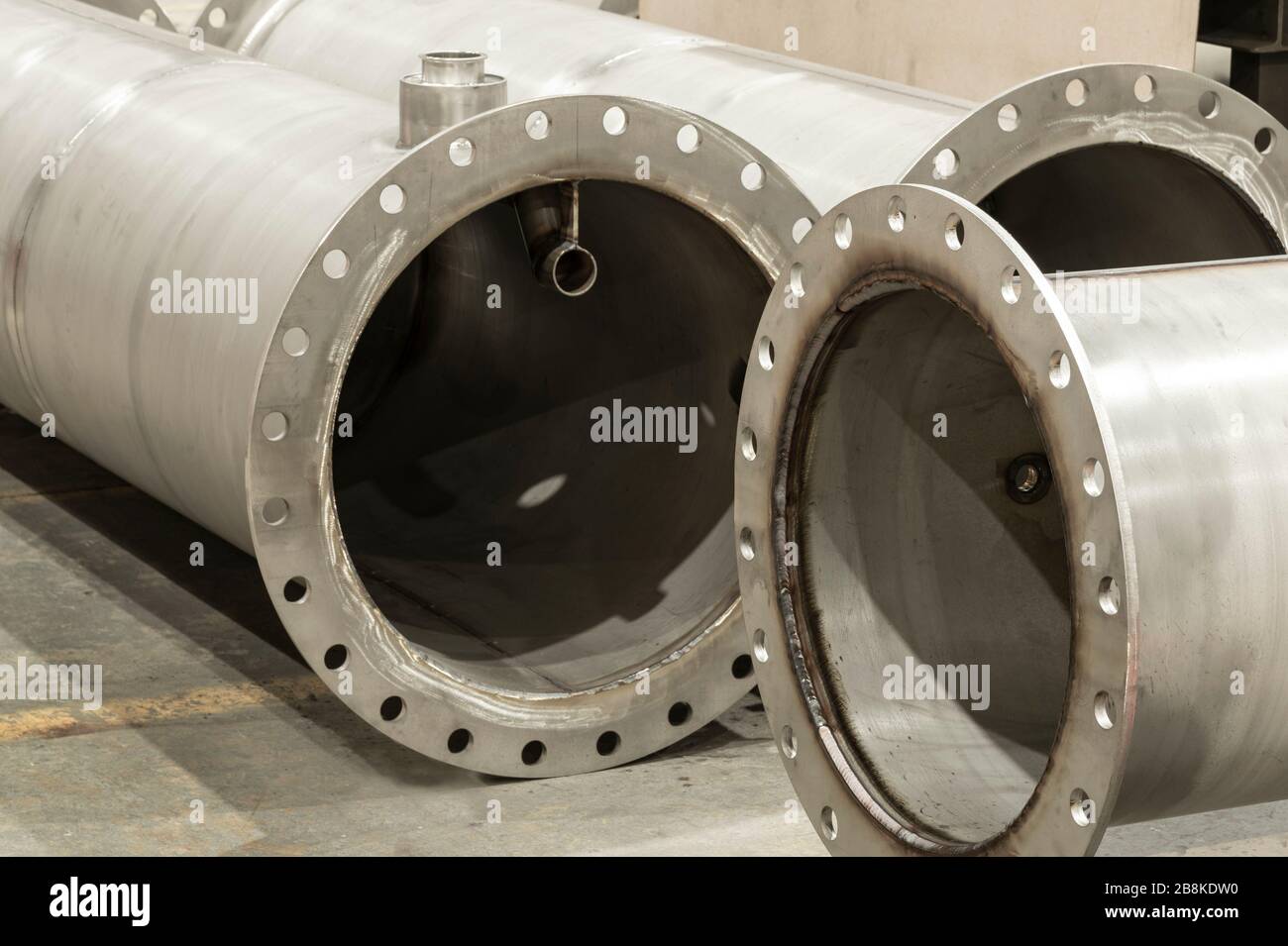 Large pipe production in industrial manufacturing plant Stock Photo