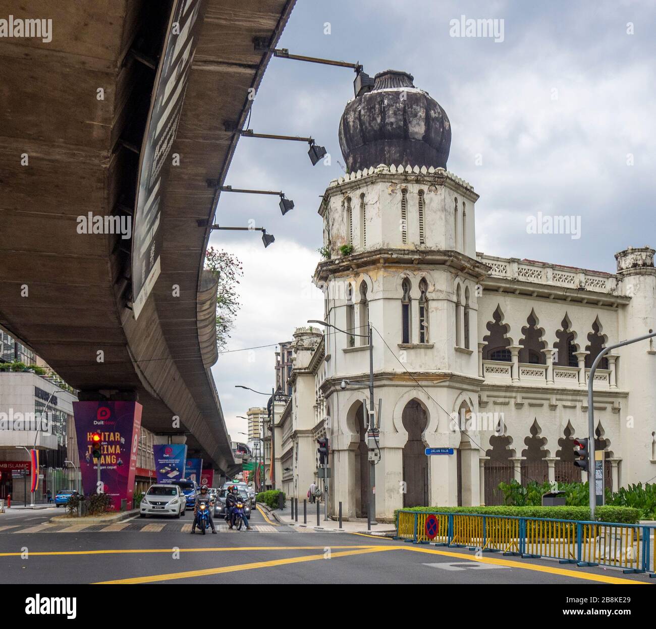 Elevated light rail system Rapid KL running along Jalan Tun Perak street and  Old Federated States of Malay Survey Office in Kuala Lumpur Malaysia. Stock Photo