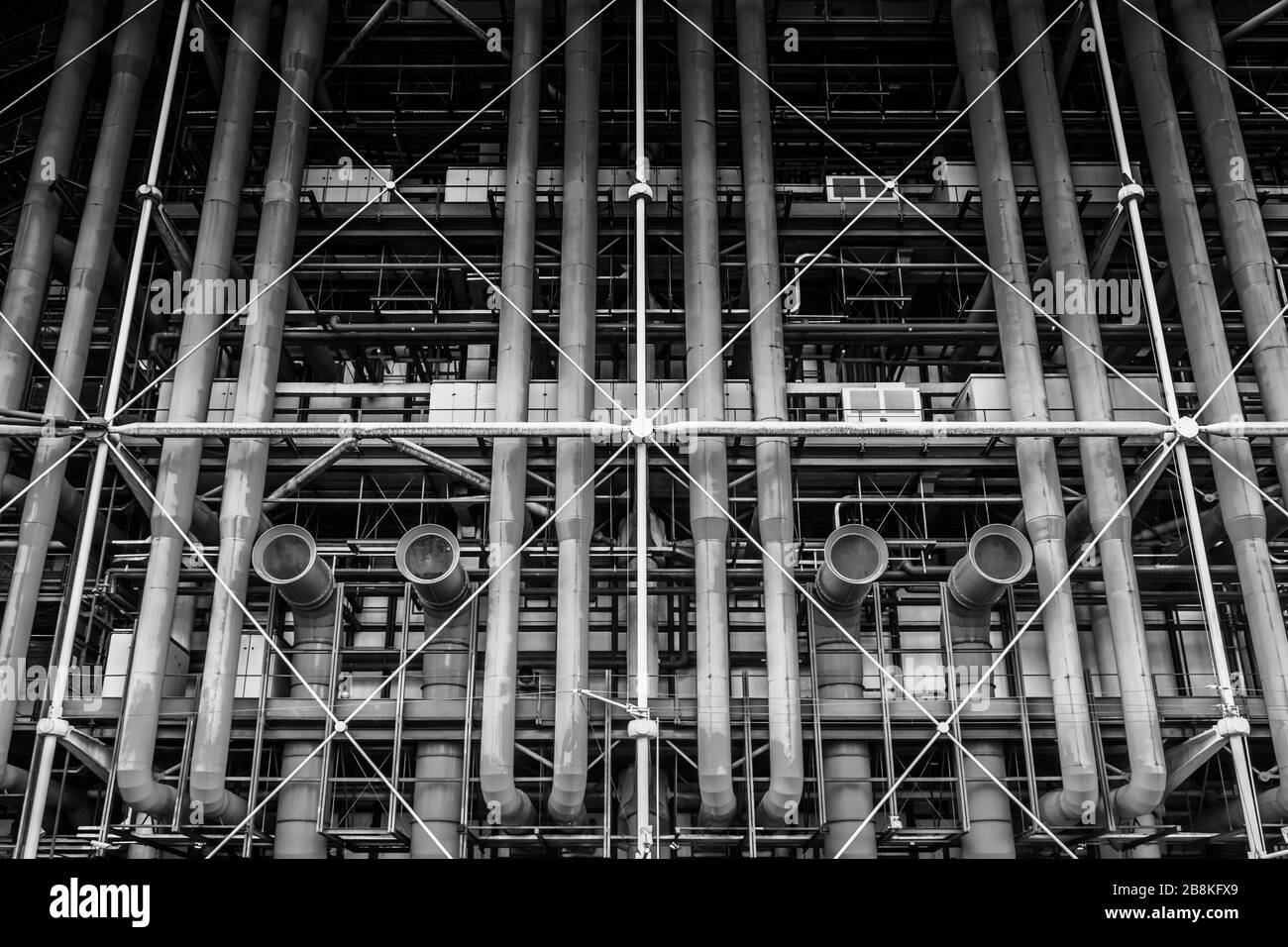 A black and white abstract grid of pipes and vents of the post-modern Centre Pompidou, Paris, France Stock Photo