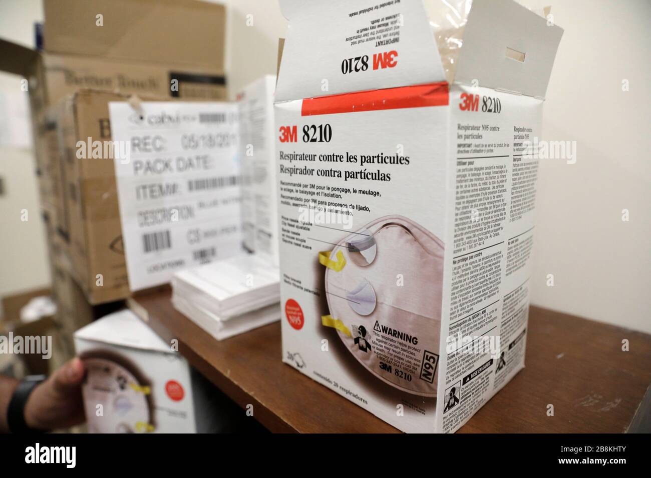 Supplies of 3M brand N95 respirator face masks a requirement now for Customs and Border Protection officers at Dulles International Airport March 13, 2020 in Dulles, Virginia. In response to the COVID-19, coronavirus pandemic CBP officers and travelers have begun wearing gloves and masks as protection from viral exposure. Stock Photo
