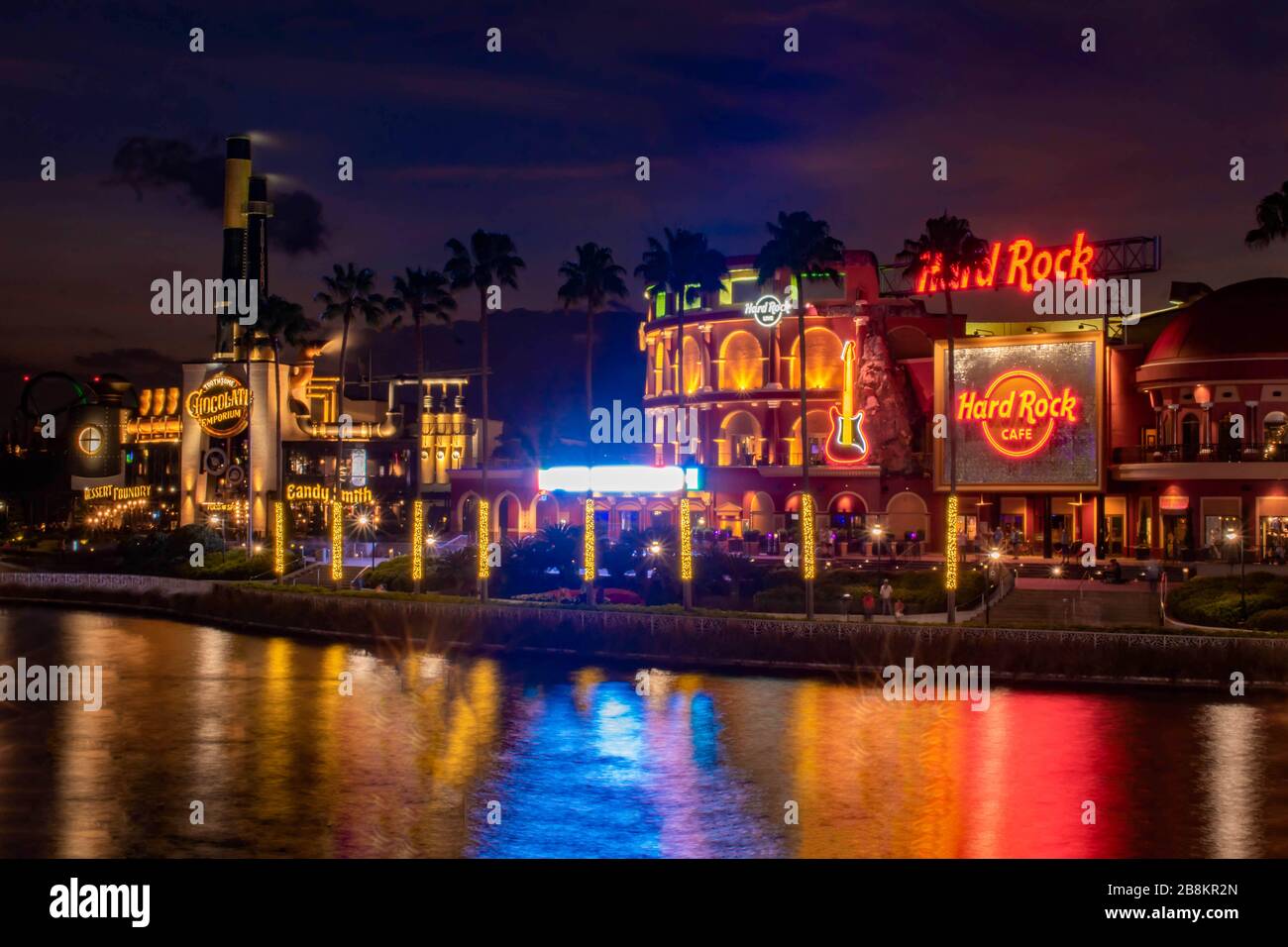 Orlando, Florida. February 12, 2020. Illuminated Hard Rock Cafe and Chocolate Emporium