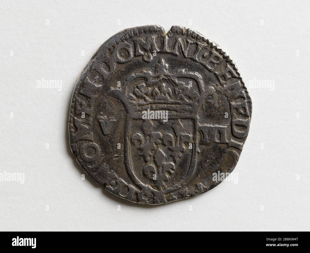 Eighth silver shield of Henry IV, 1607 Huitième d'écu en argent d'Henri IV. Argent. 1607. Paris, musée Carnavalet. Stock Photo