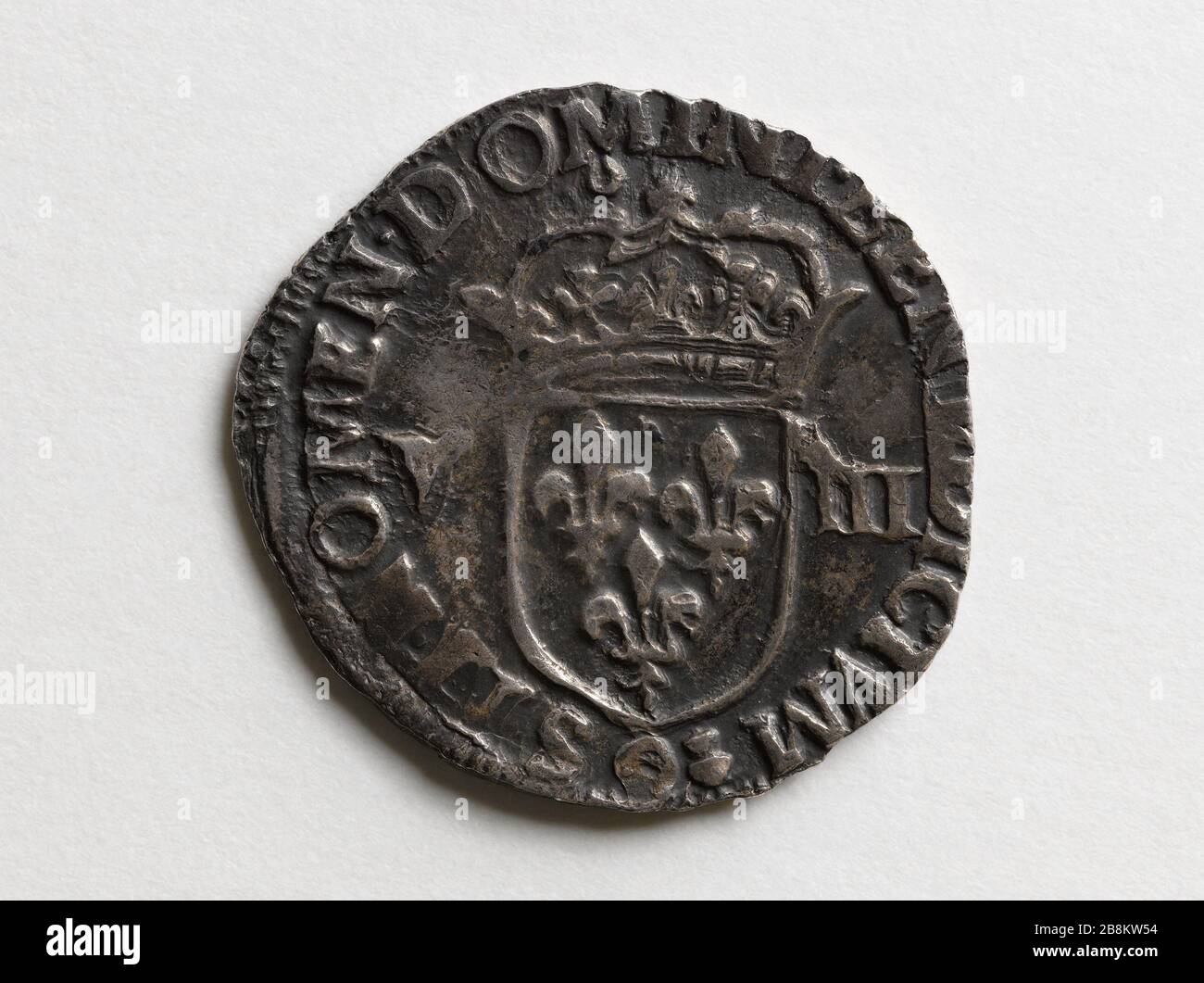 Eighth silver shield of Henry IV, 1589-1610 Huitième d'écu en argent d'Henri IV. Argent. 1589-1610. Paris, musée Carnavalet. Stock Photo