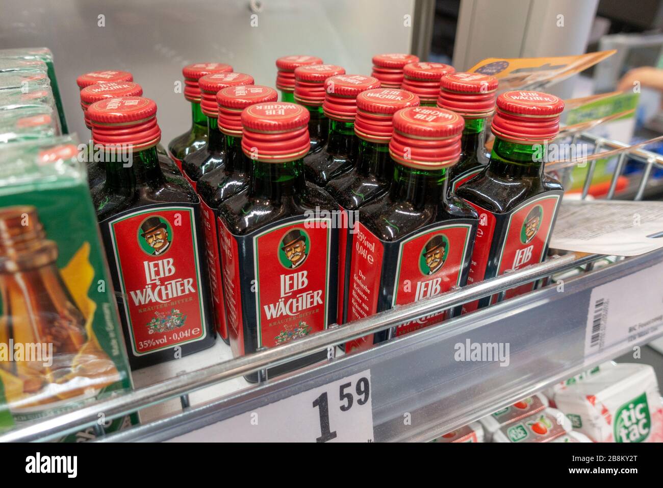Bottles of Leib Wächter, a bitter herbal liqueur from Germany on a shop shelf in Austria. Stock Photo