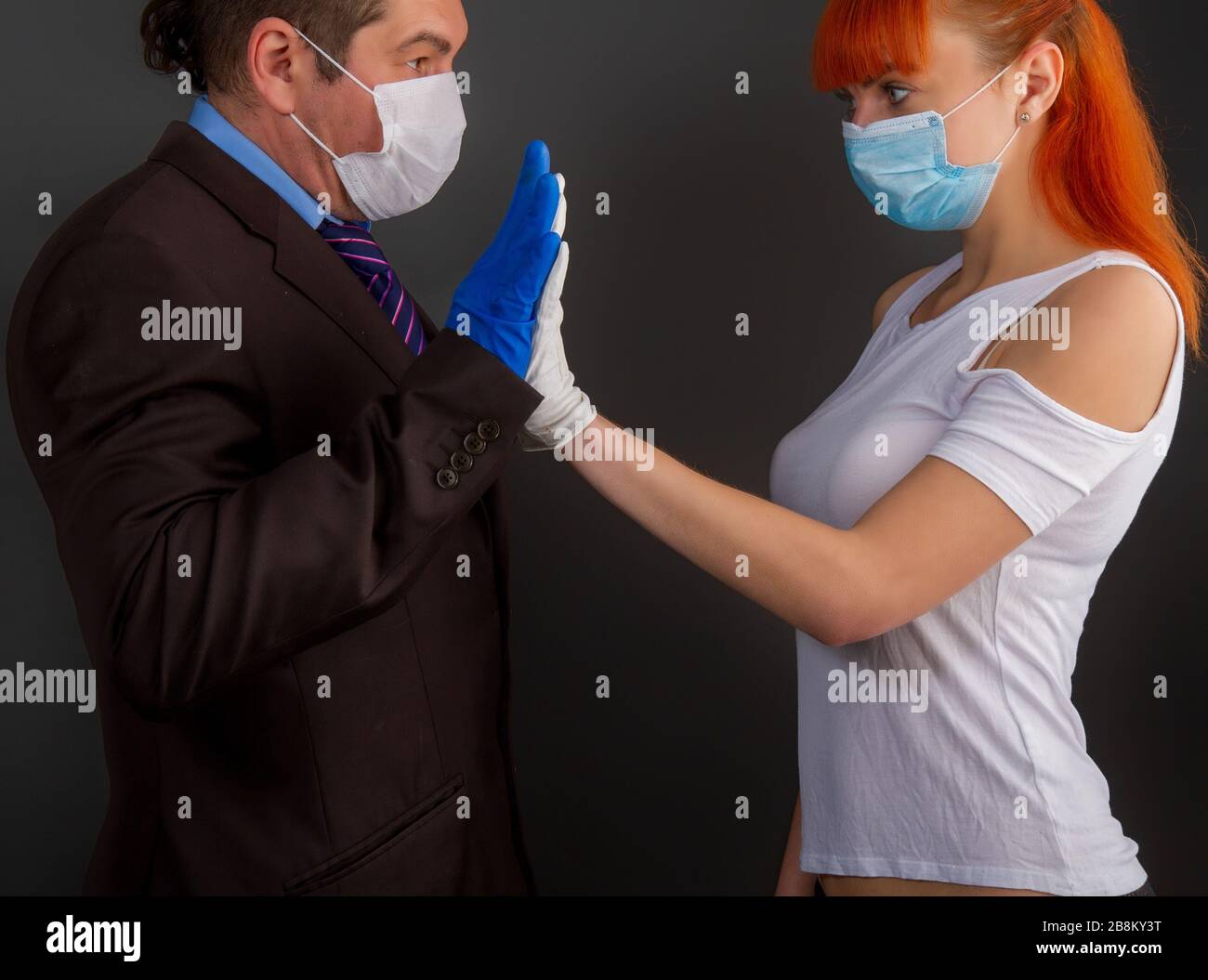 masked man and girl Stock Photo