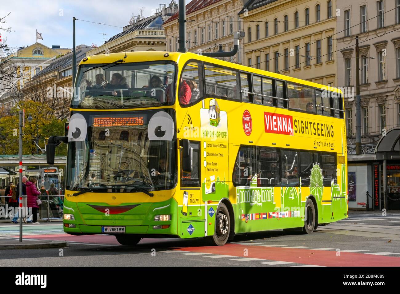 VIENNA, AUSTRIA - NOVEMBER 2019: Double deck tourist bus operated by Vienna Sightseeing driving in Vienna city centre Stock Photo