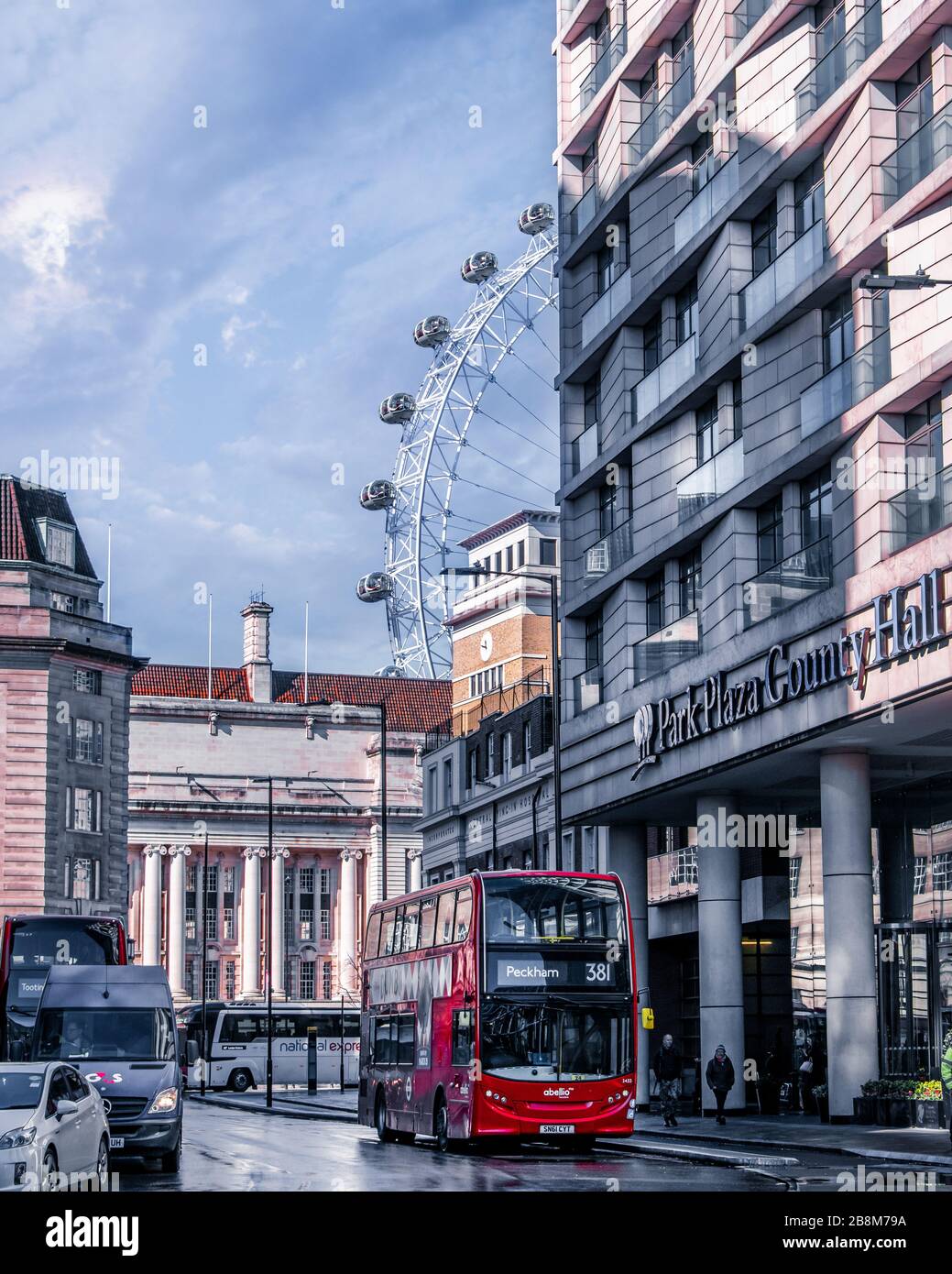 Rainy morning in London,UK. London Eye. Red bus in the streets of London Stock Photo
