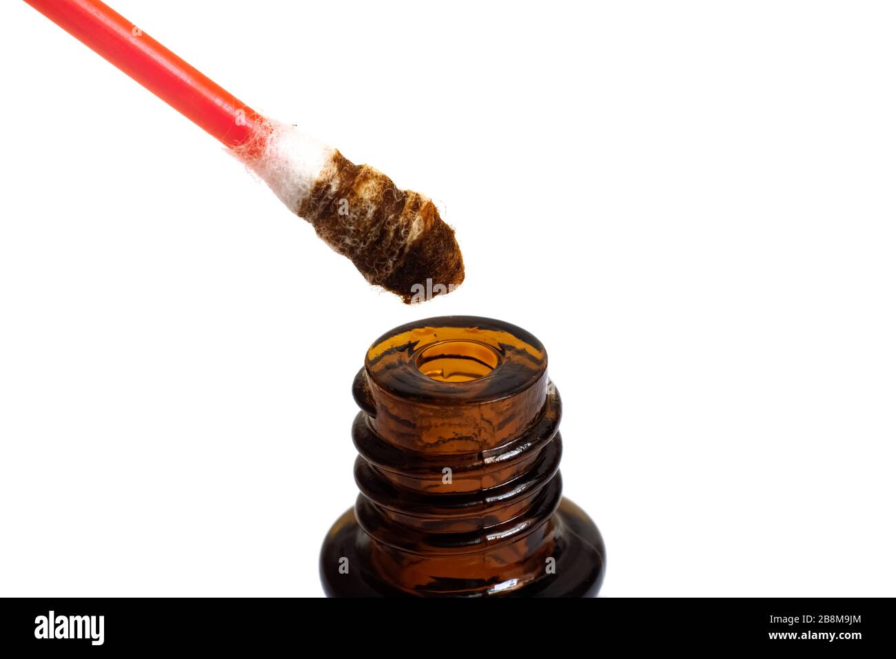 Jar with iodine and cotton swab isolated on white background Stock