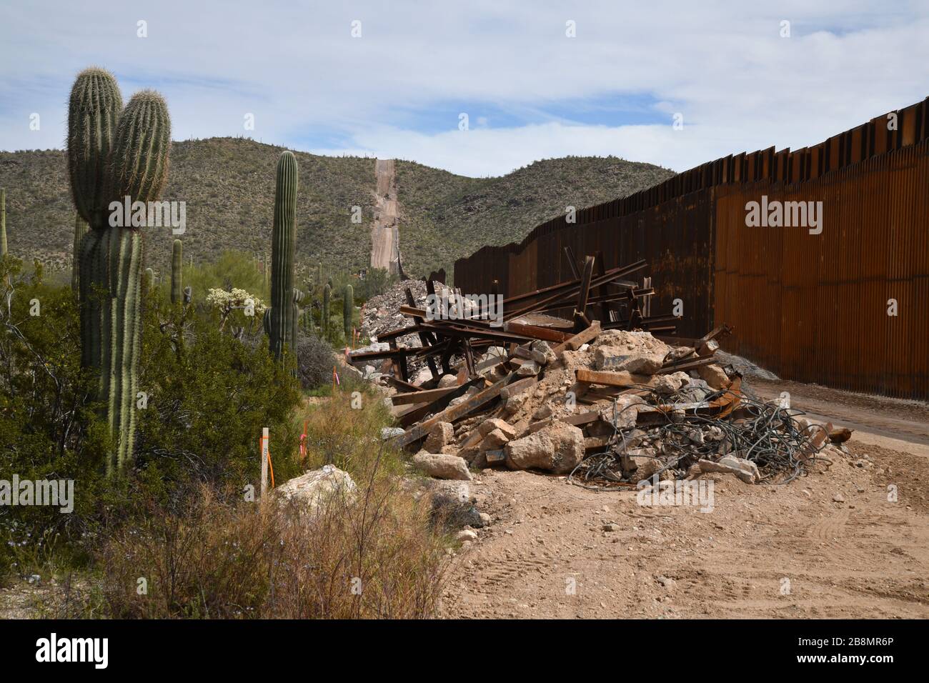 Construction of a metal border wall in Organ Pipe Cactus National Monument, Sonoran Desert, in
