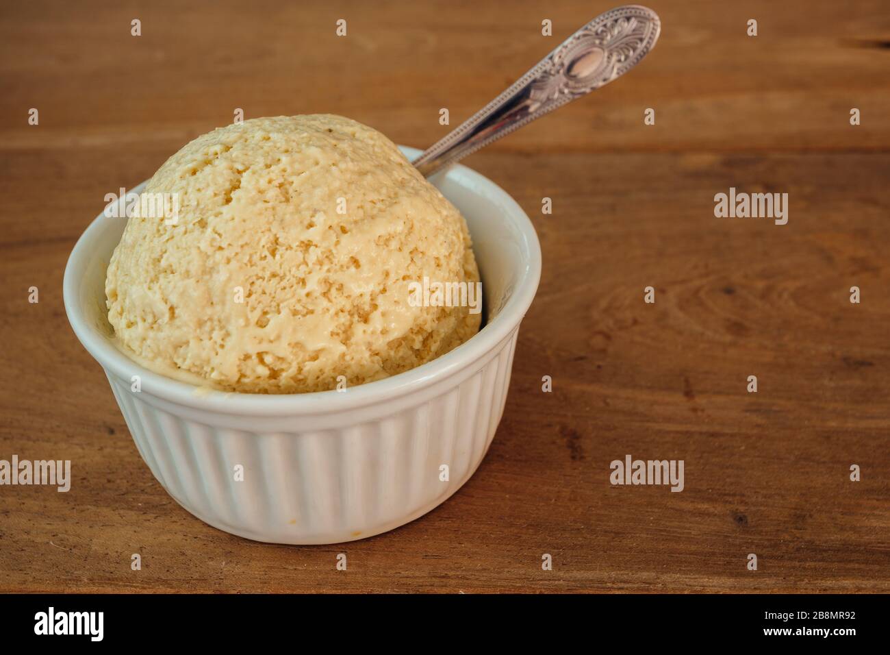 Soy milk ice cream in white ceramic bowl (ramekin), ready to eat, on