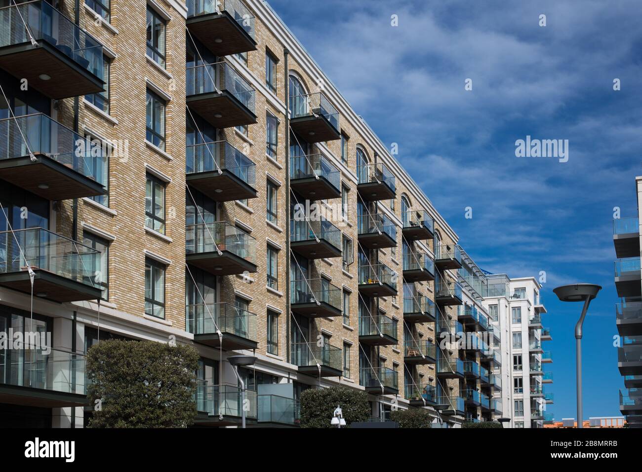 Balconies Windows at Fulham Reach, Parr's Way, Hammersmith, Fulham, London W6 9GD Stock Photo