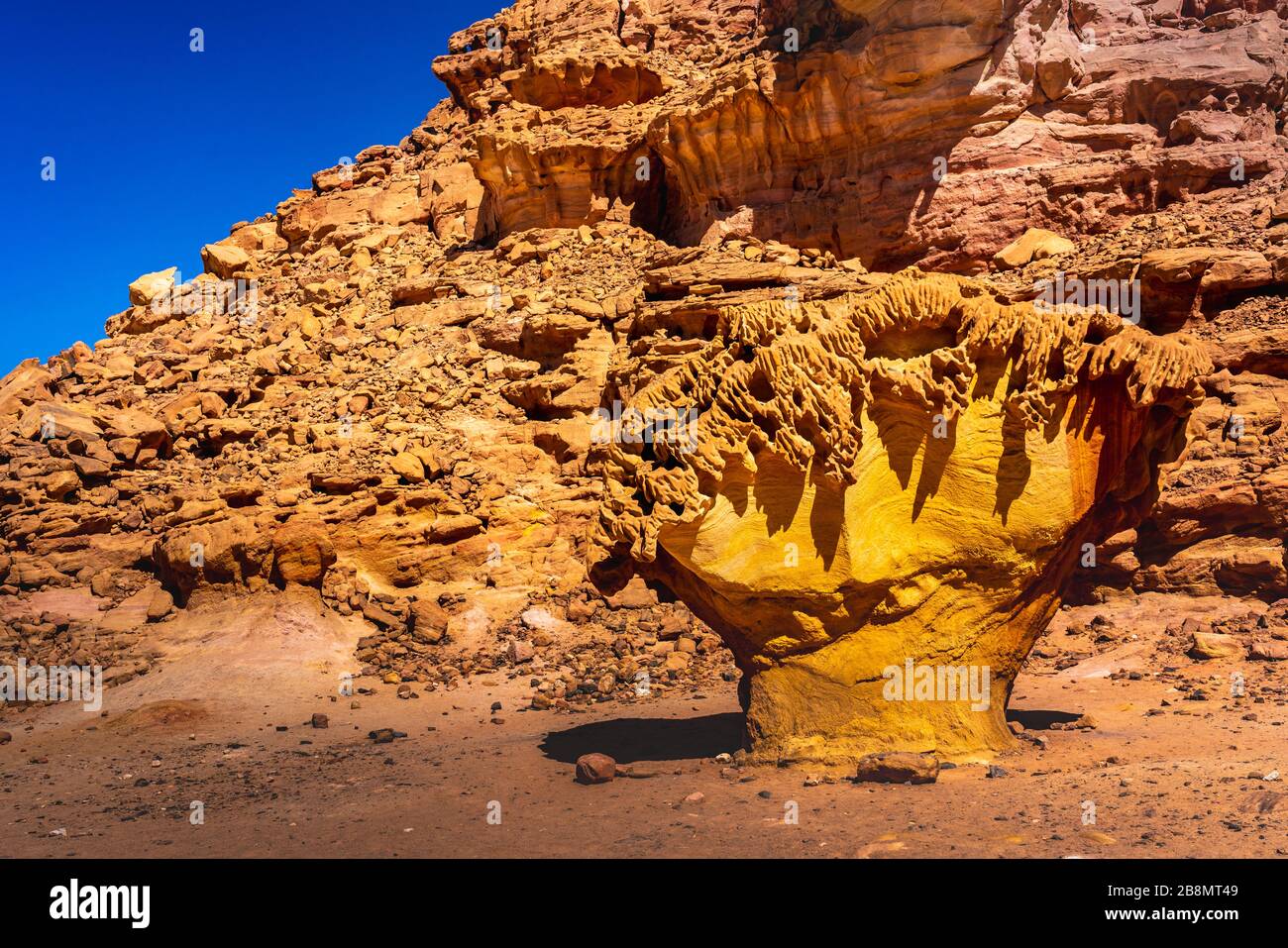 The mushroom rock in a  desert landscape in the sandstone region of the Sinai, Egypt, Stock Photo