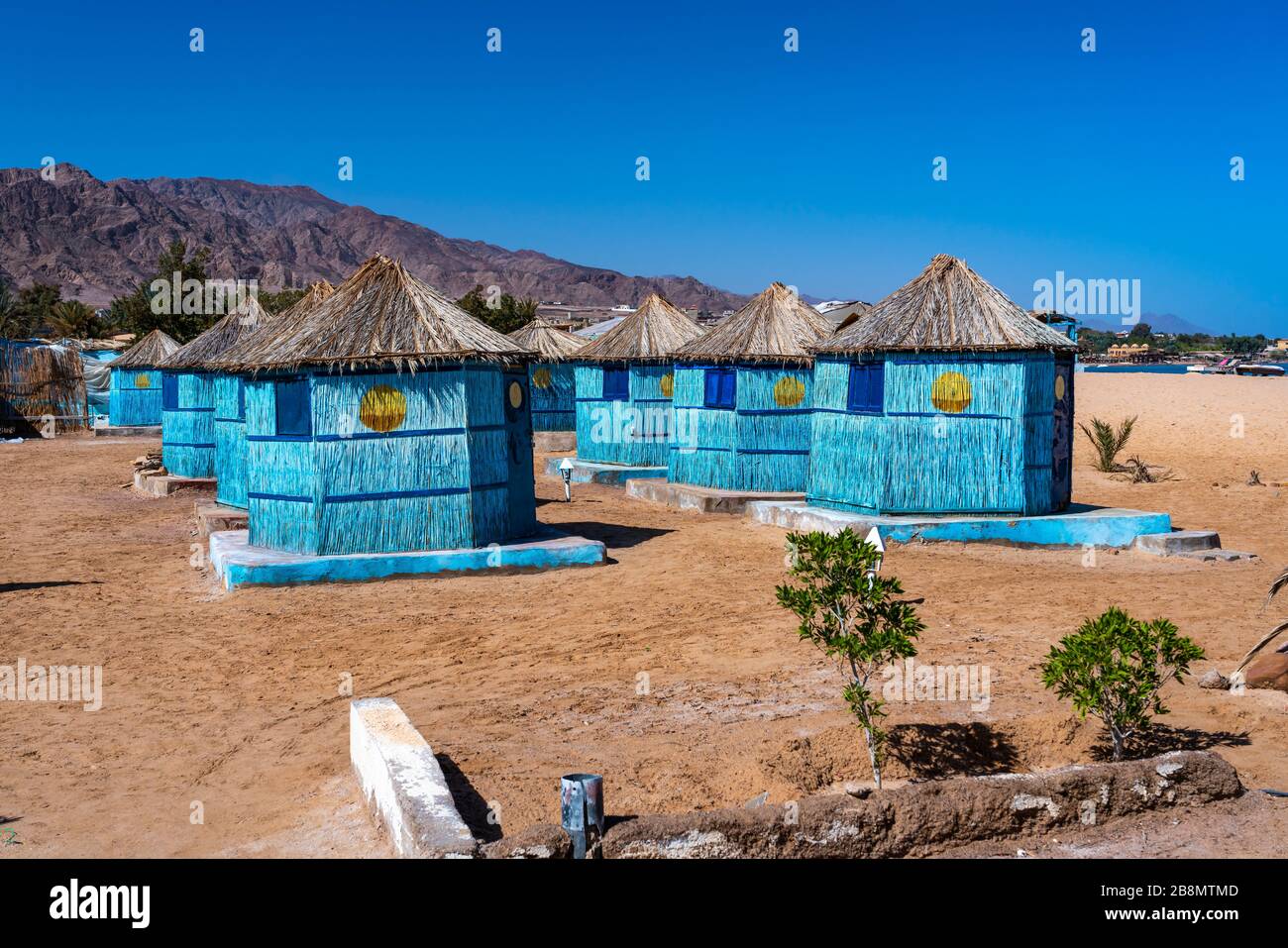 Blue beach huts on the Red Sea near Nuweiba, Sinai, Egypt. Stock Photo