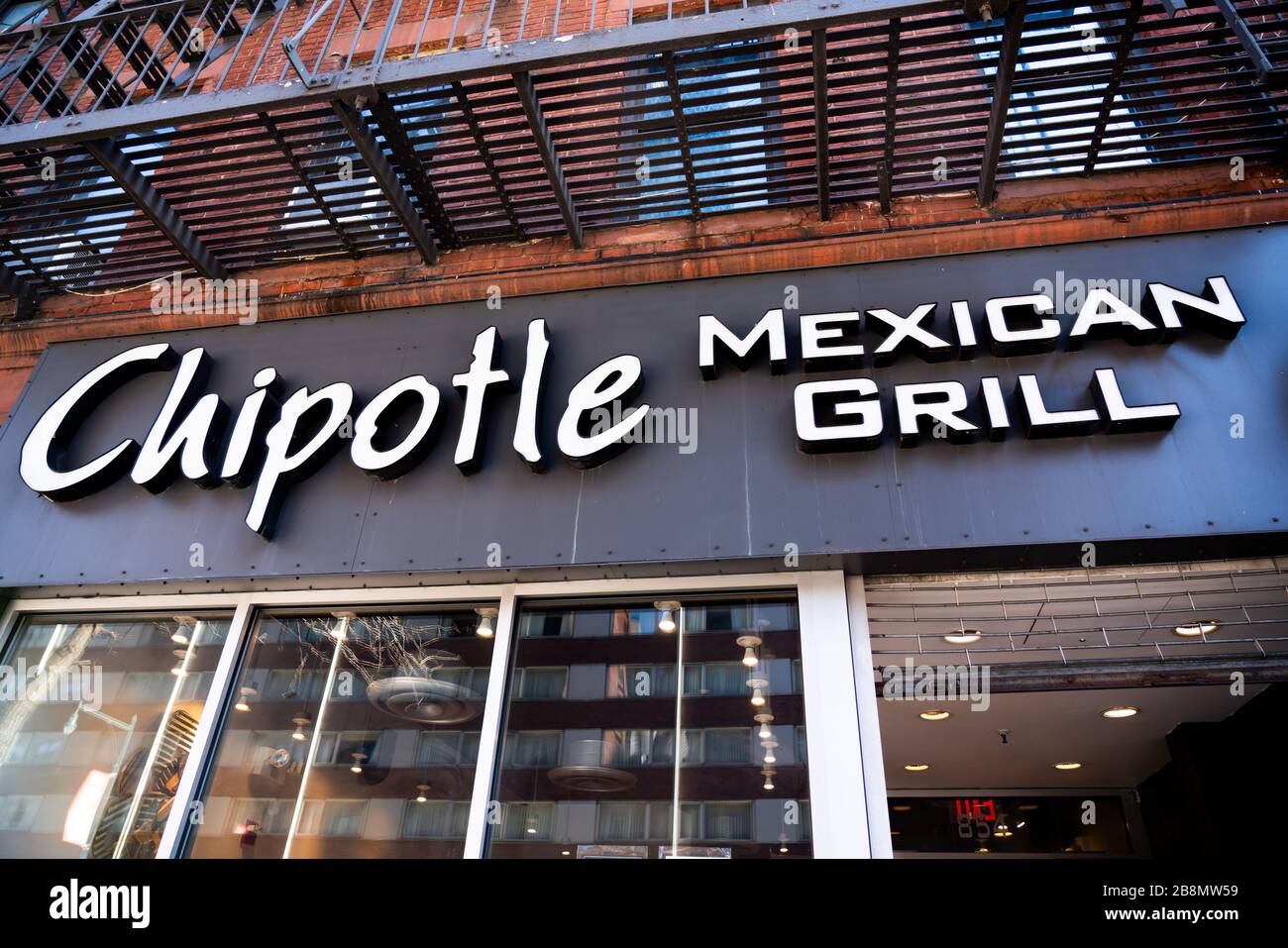 American fast casual restaurants chain, Chipotle Mexican Grill logo seen in Midtown Manhattan. Stock Photo