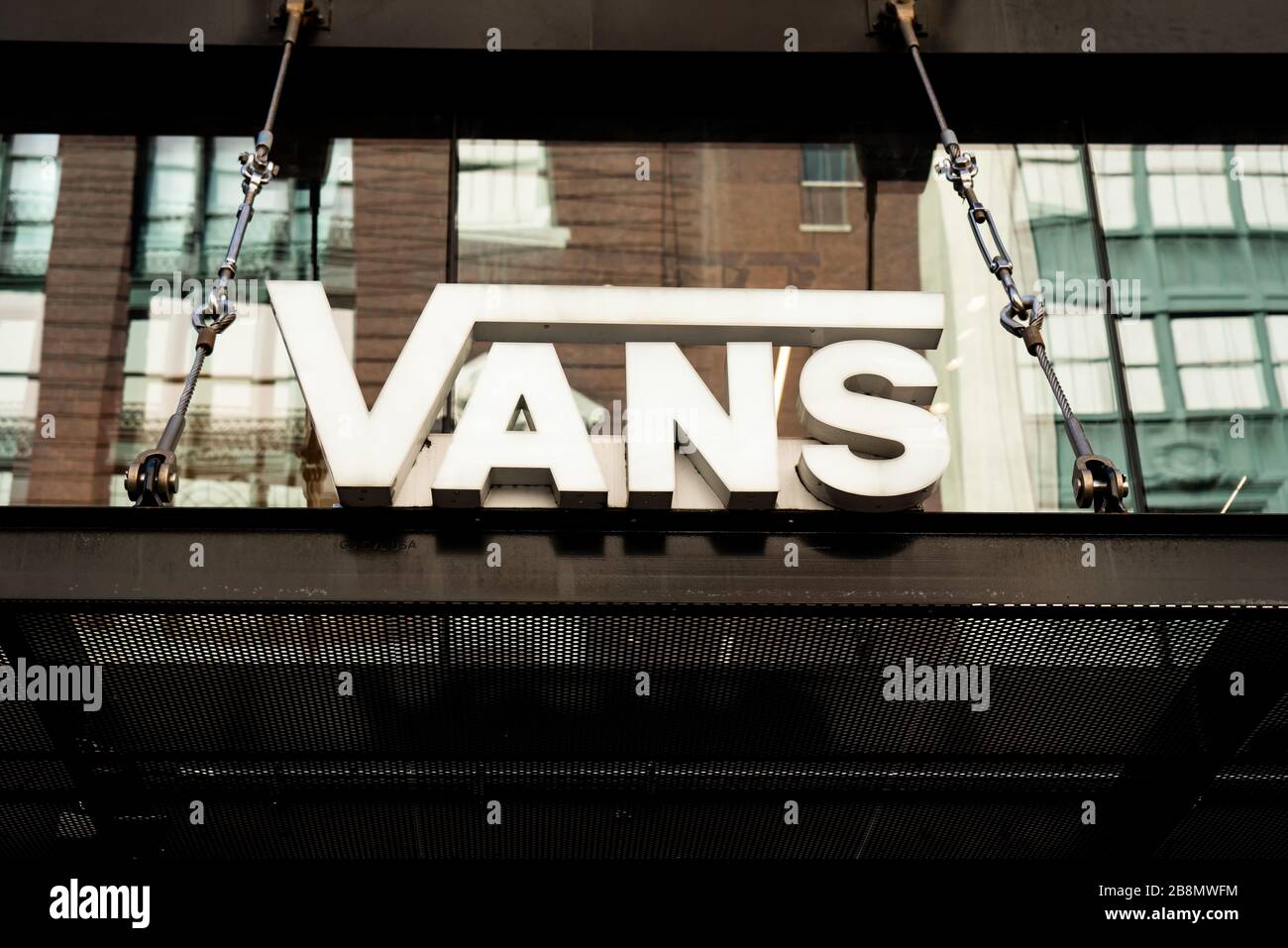 Vans store logo seen in New York City Stock Photo - Alamy