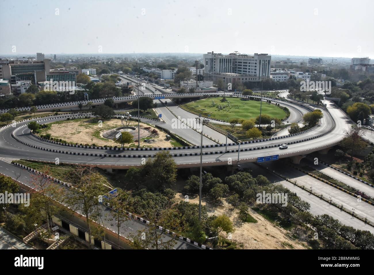 Ariel view of AIIMS flyover deserted during the first day of the civil curfew.The Indian government imposed a nationwide Janata (civil) curfew as a preventive measure against the COVID-19 virus that is regarded as a pandemic. Stock Photo
