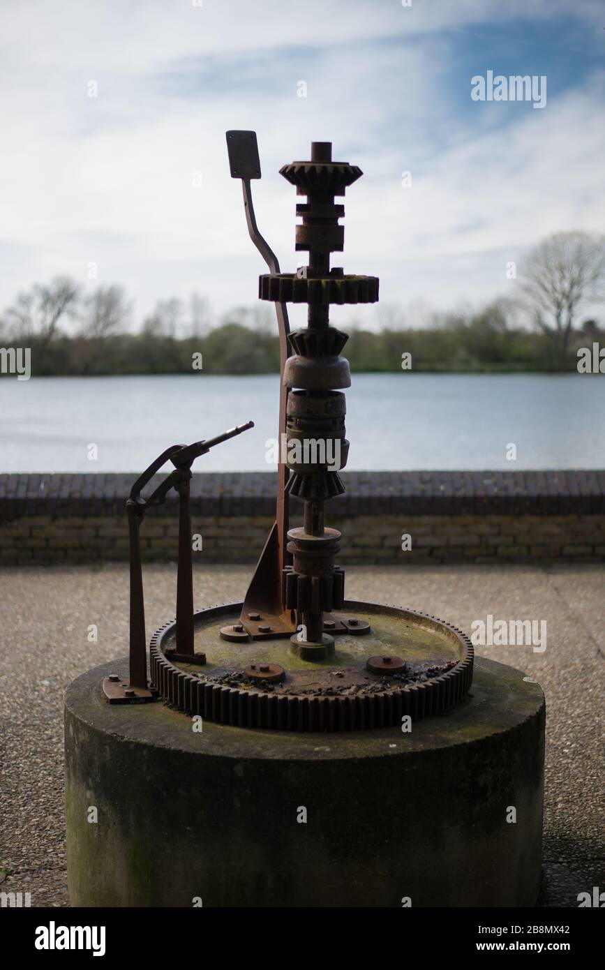 Oil Works Machinery Spindles Cogs Teeth on the Thames Path, Hammersmith, Fulham, London Stock Photo