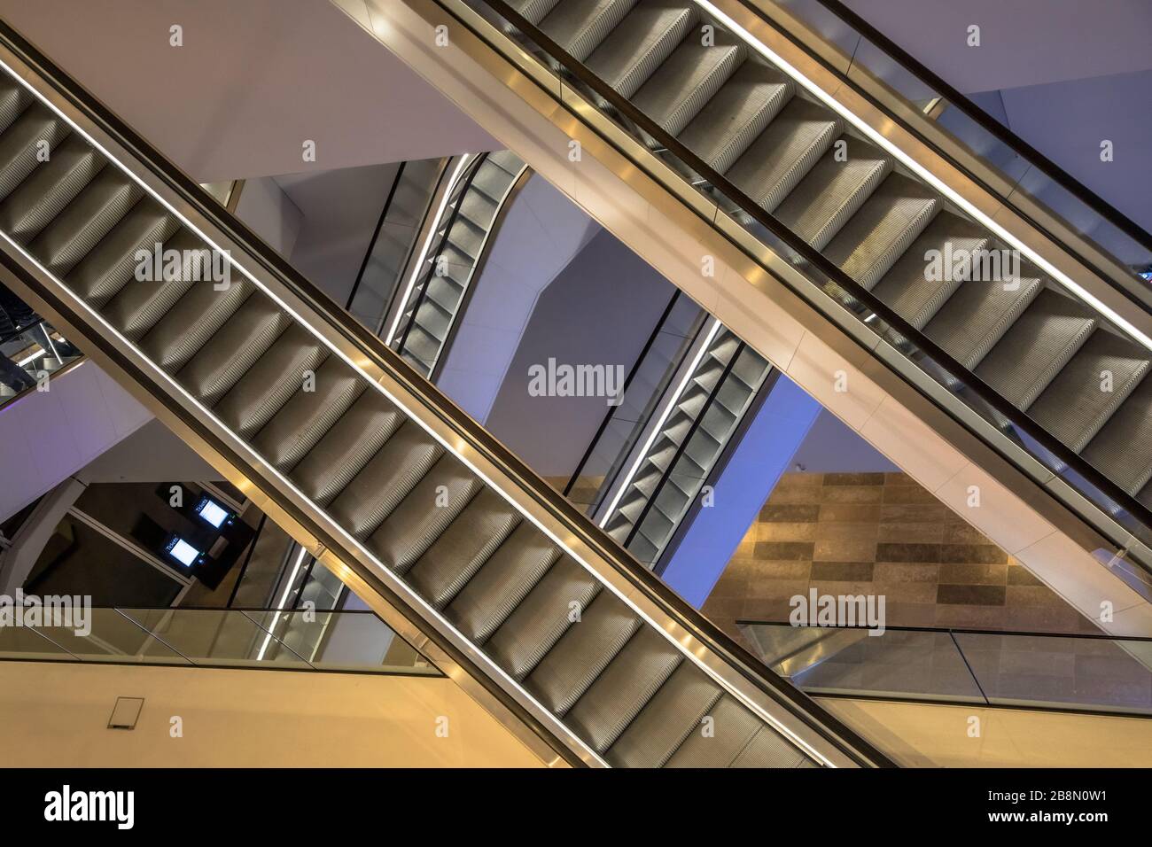 Empty Escalators in modern public library seen from above. Stock Photo