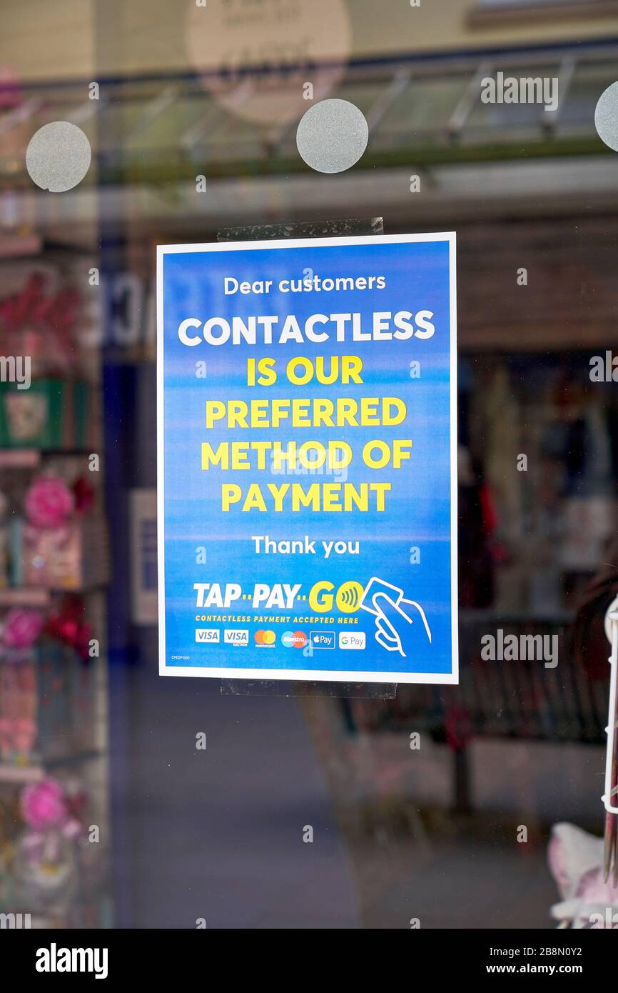 Contactless payment poster in shop window Stock Photo