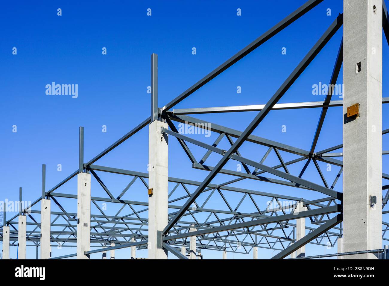 The steel frame of a building under construction Stock Photo