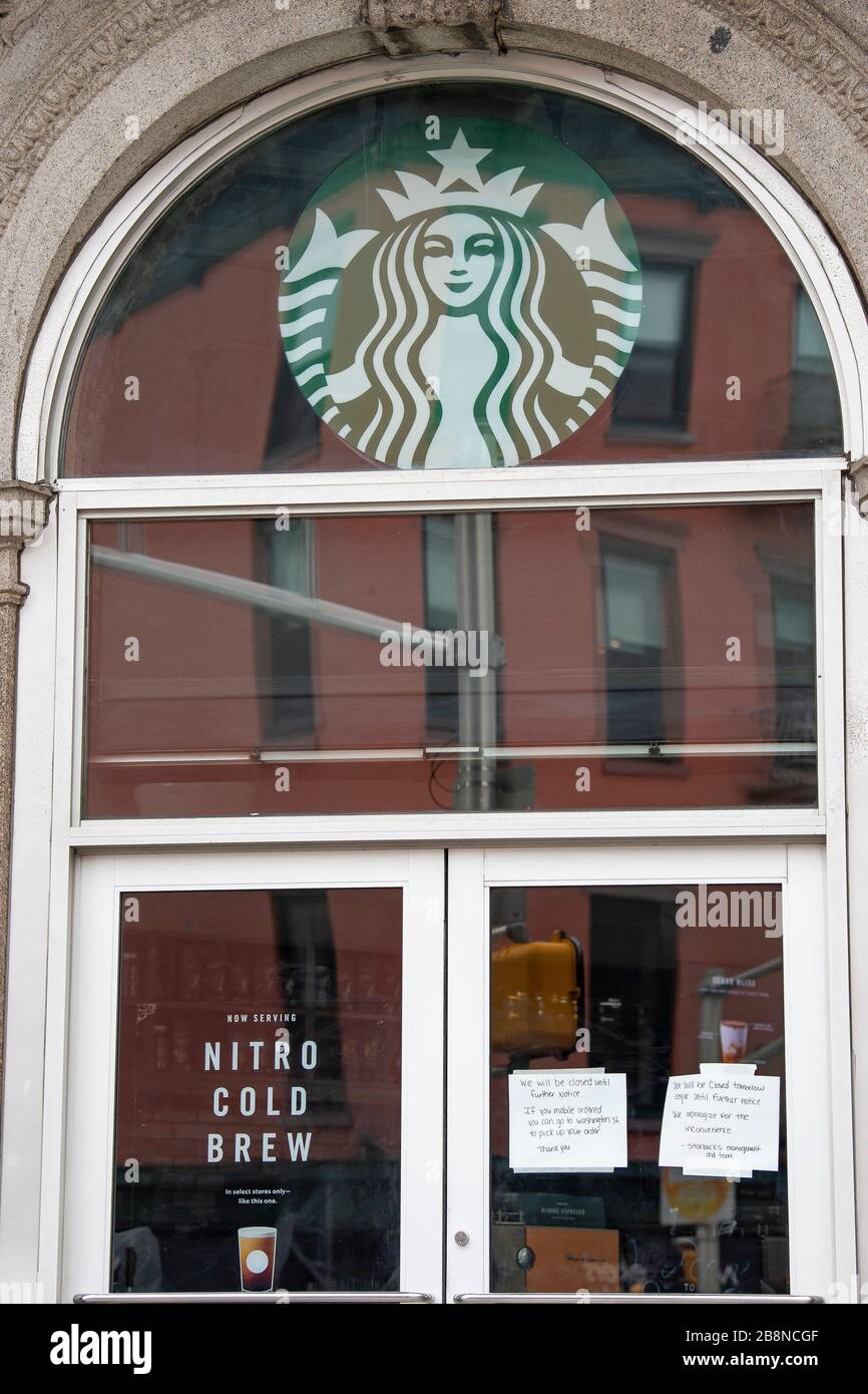 Hoboken, New Jersey, USA. 20th Mar, 2020. Starbucks places closure signs on the front doors as local stores are under quarantine in Hoboken, New Jersey. Mandatory credit: Kostas Lymperopoulos/CSM/Alamy Live News Stock Photo