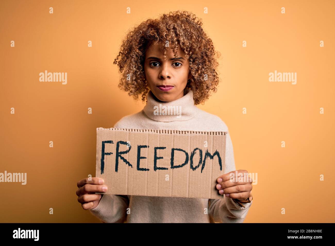 African american activist woman asking for liberty holding banner with ...