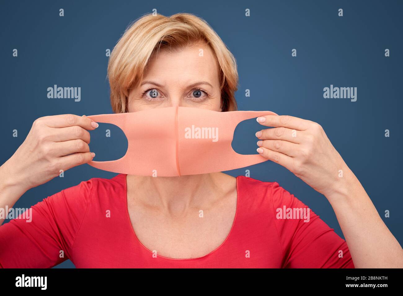 Woman medical mask hands hi-res stock photography and images - Alamy