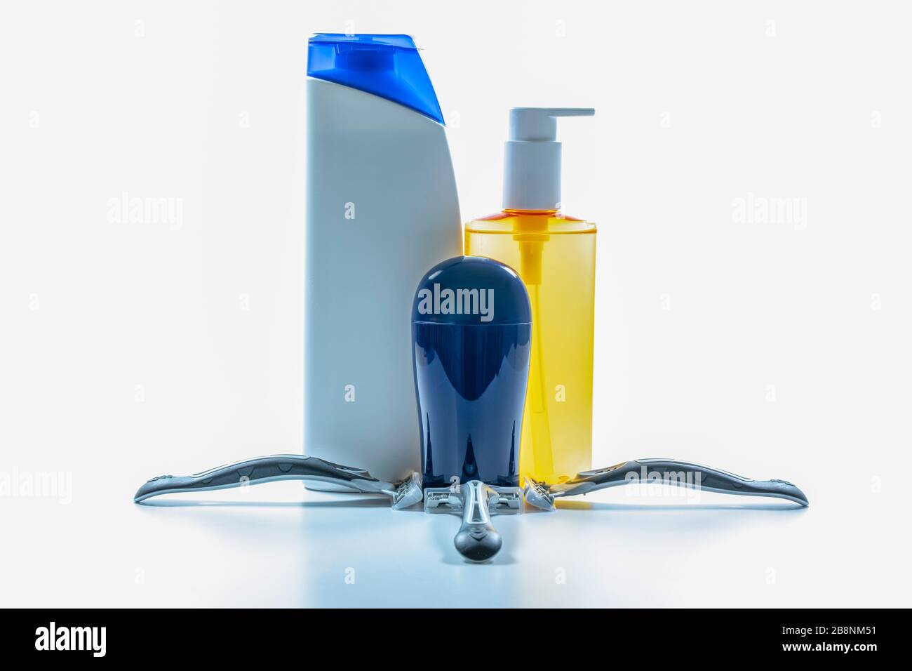 Shampoo bottles and razor blade closeup for male Stock Photo Alamy