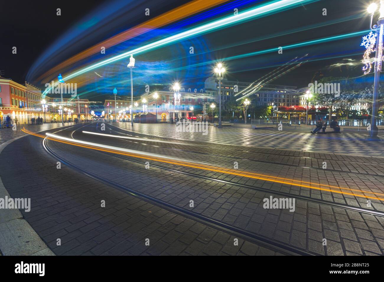 People walking on Place Massena in Nice, France Stock Photo