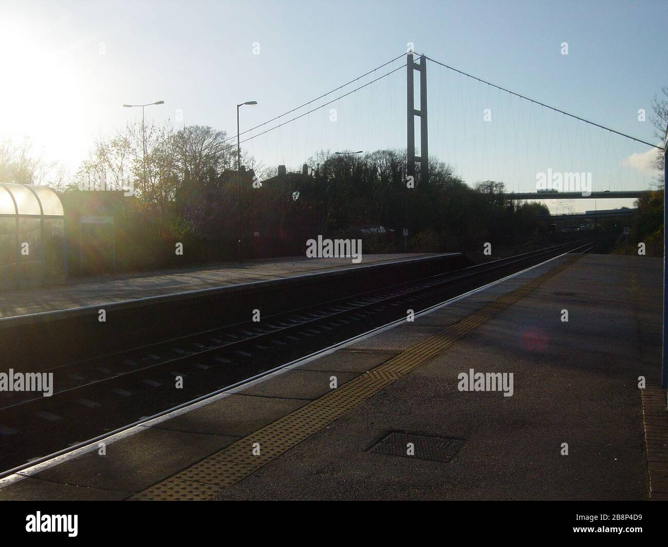 'English: The Humber Bridge from Platform Two of Hessle railway station, Hessle, East Riding of Yorkshire, England. Author: Anthony Shreeve; 8 December 2005; Transferred from en.wikipedia to Commons by RHaworth using CommonsHelper.; Pa-merynaten at English Wikipedia; ' Stock Photo