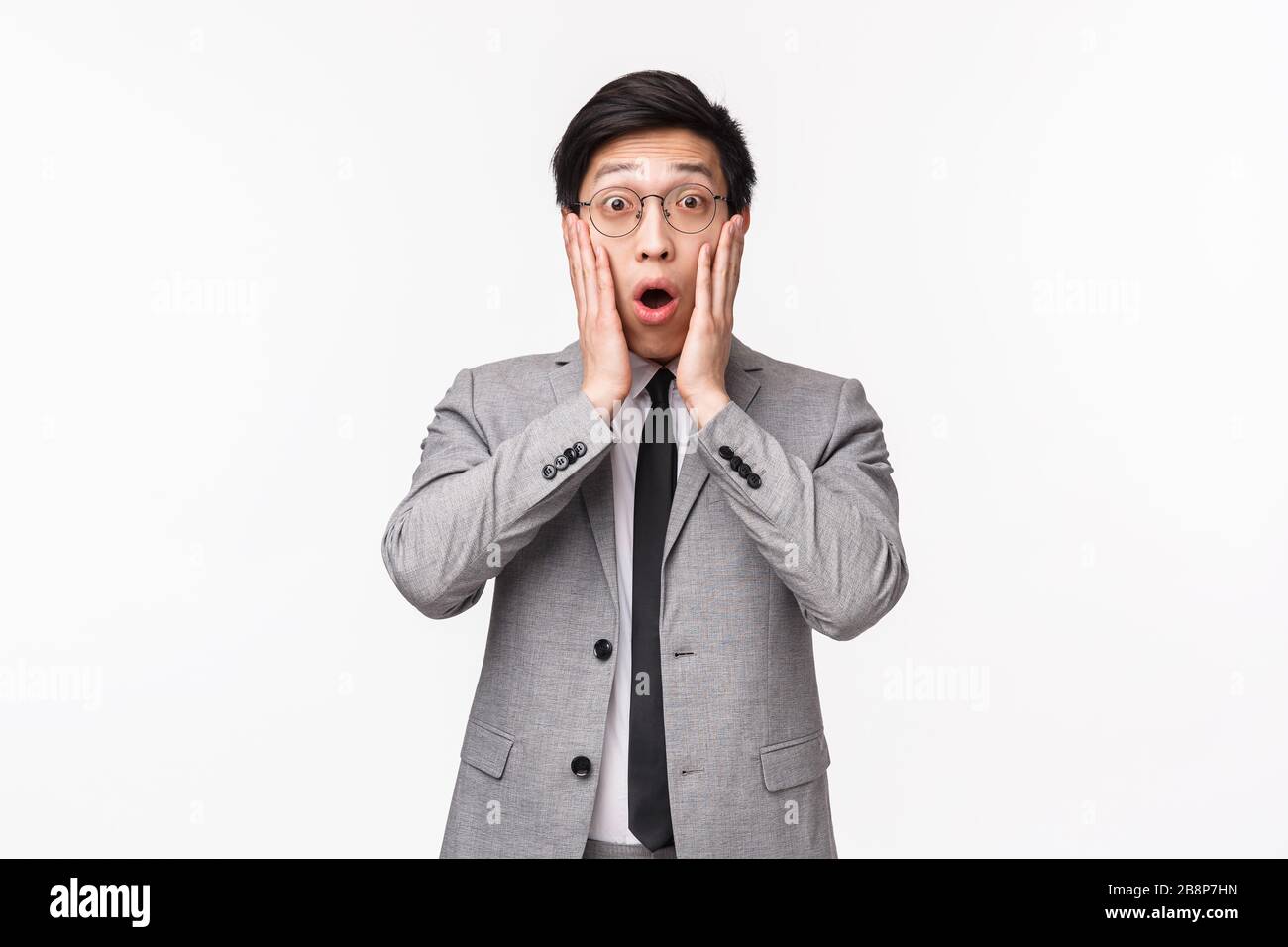 Impressed shocked looking japanese man hi-res stock photography and ...