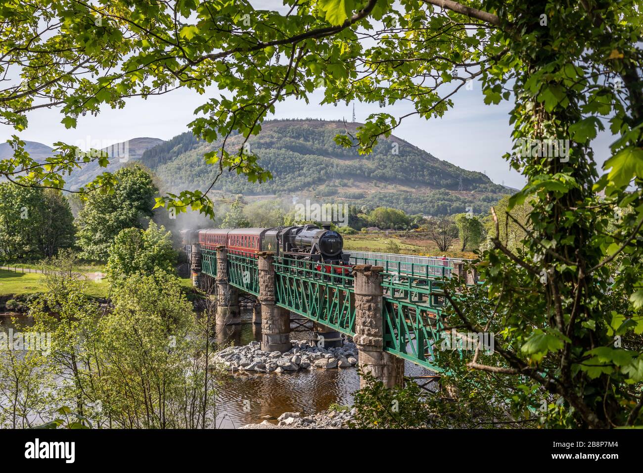BR '5MT' 4-6-0 No. 45212 crosses the River Lochy with the 10.15 Jacobite from Fort William to Mallaig - May 14th 2019 Stock Photo