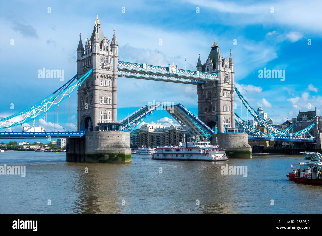 London, GB, may 5th 2016: London Tower Bridge path lifted to allow tourist ferry passing trough Stock Photo