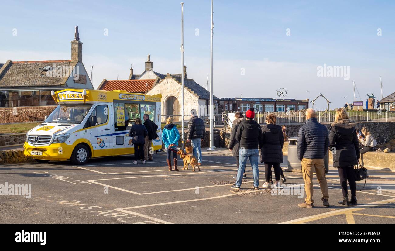 Coronavirus Social Distancing - People in a queue at an Ice Cream van in North Berwick, East, Lothian, Scotland, UK. Stock Photo