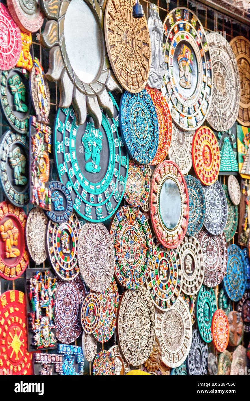 Intricate Mexican Mayan culture souvenirs on display along popular 5th Avenue on Playa del Carmen in the Yucatan peninsular of Mexico near Cancun. Stock Photo