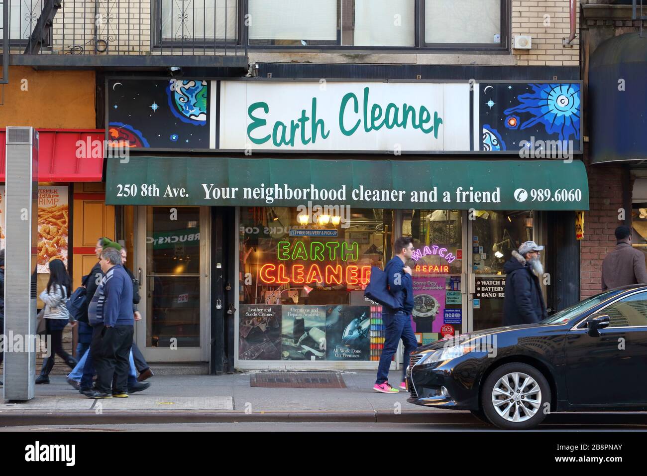 Earth Cleaner, 250 8th Ave, New York, NY. exterior storefront of a dry cleaners, watch repair