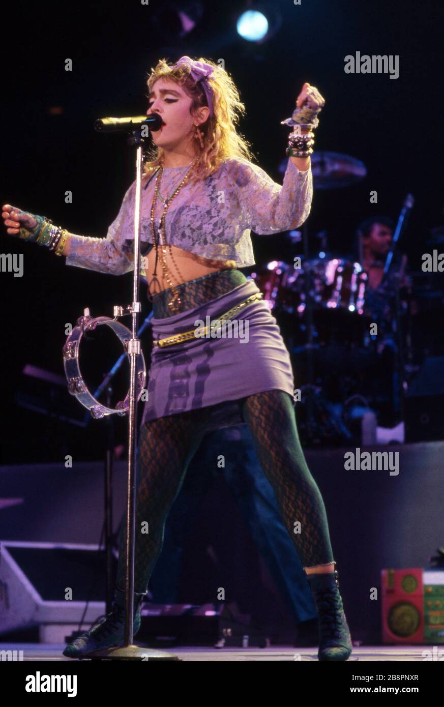 DETROIT - MAY 25: American, singer, songwriter and actress, Madonna, on stage during the 'Virgin Tour' on May 25, 1985, at Cobo Arena in Detroit, Michigan.  Credit: Ross Marino Archive / MediaPunch Stock Photo
