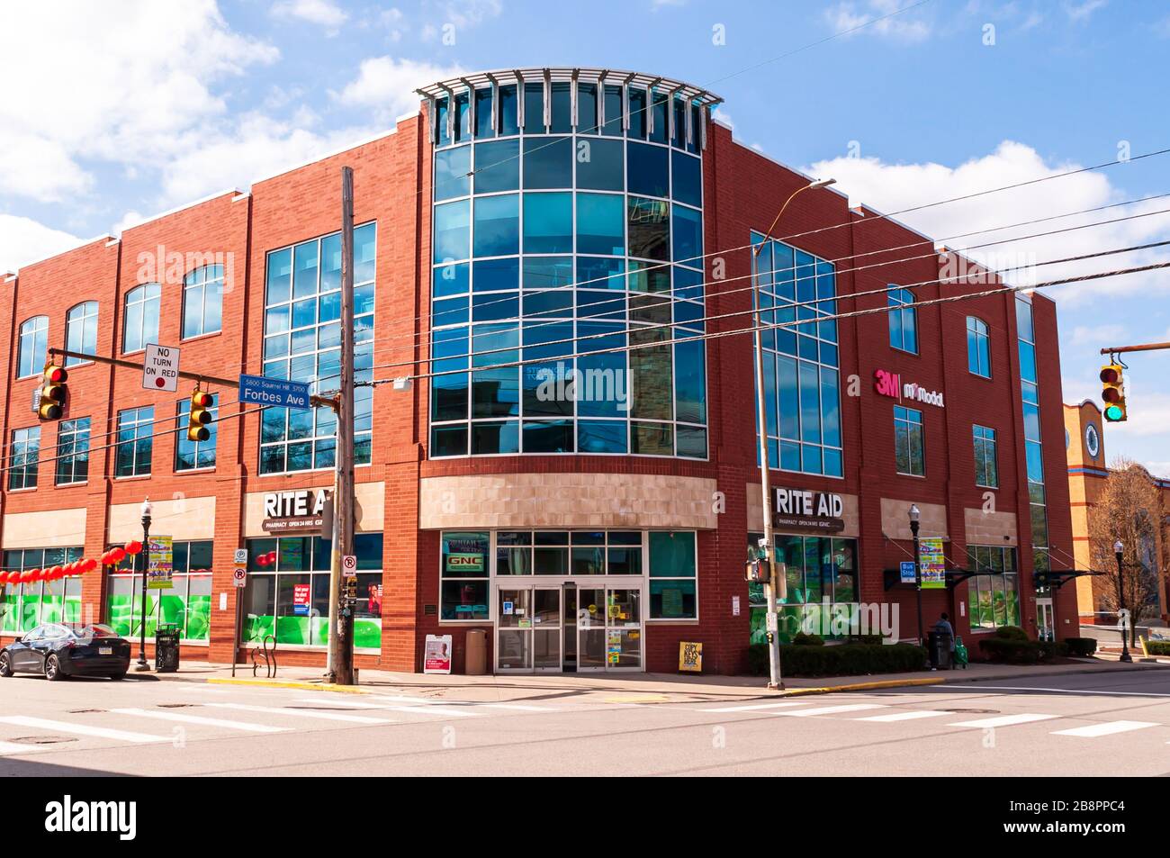 A building at the corner of Forbes and Murray Avenues with a Rite Aid