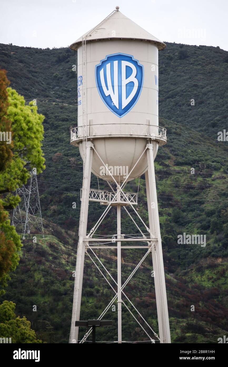 Burbank, California, USA. 22nd March, 2020. An exterior view of the Warner Bros. Water Tower at Warner Bros. Studios in Burbank, temporarily closed in response to coronavirus COVID-19 pandemic, three days after the 'Safer at Home' order issued by both Los Angeles Mayor Eric Garcetti at the county level and California Governor Gavin Newsom at the state level on Thursday, March 19, 2020 which will stay in effect until at least April 19, 2020 amid the Coronavirus COVID-19 pandemic United States. Credit: Image Press Agency/Alamy Live News Stock Photo