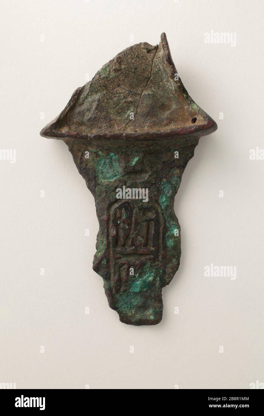 'Inscribed Dagger Hilt and Handle (image 3 of 3); Egypt, New Kingdom, 19th Dynasty, reign of Ramses II (1304 - 1237 BCE) or later Arms and Armor; daggers Bronze Width:  1 15/16 in. (5 cm); Weight: 65.1 g; Length:  3 5/16 in. (8.4 cm) Gift of Carl W. Thomas (M.80.203.48) Egyptian Art; Reign of Ramses II (1304 - 1237 BCE) or later; ' Stock Photo