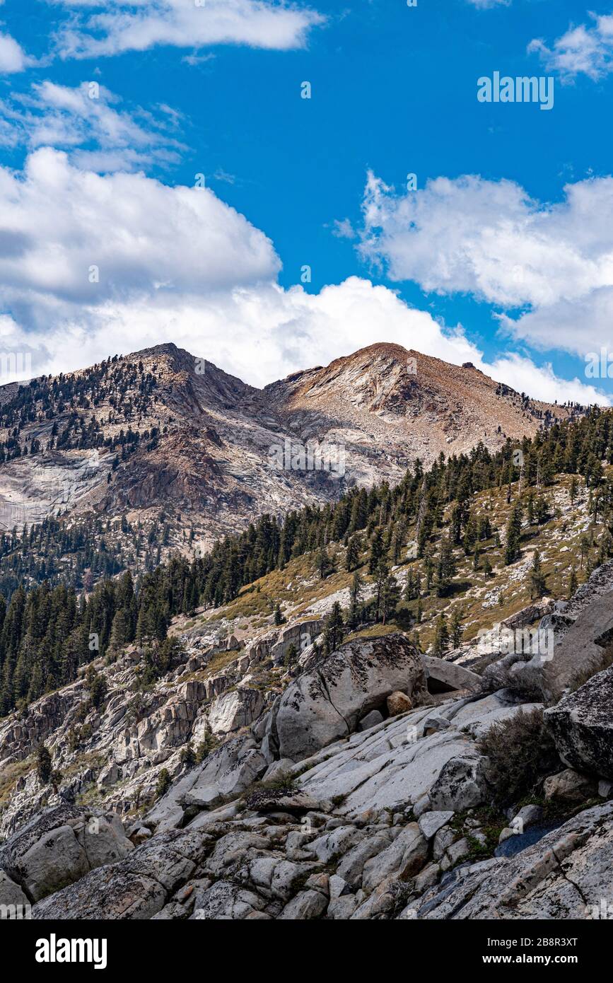 The Lakes Trail in Sequoia National Park offers breathtaking views of the polished granite Sierra range overlooking the Kaweah Valley. Stock Photo